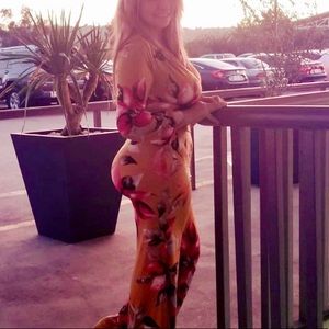 Mustard color floral jumpsuit size M